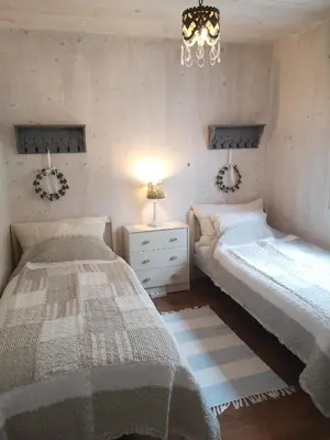 Ein Bett oder Betten in einem Zimmer der Unterkunft Countryhouse Lake Attersee - Atemberaubende Lage - Bezauberndes Hideaway