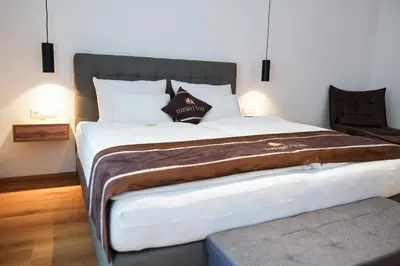Ein Bett oder Betten in einem Zimmer der Unterkunft stadtwirt bruck