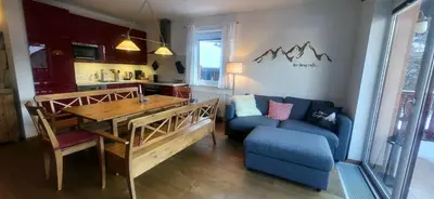 Ein Sitzbereich in der Unterkunft Dachsteinblick by Alpendyll Apartments