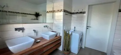 Ein Badezimmer in der Unterkunft Dachsteinblick by Alpendyll Apartments