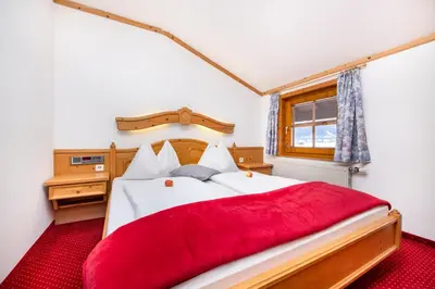 Ein Bett oder Betten in einem Zimmer der Unterkunft Laubichlhof