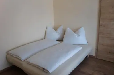 Ein Bett oder Betten in einem Zimmer der Unterkunft Appartements Real