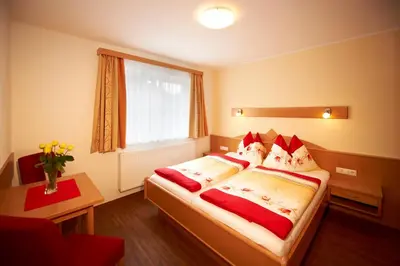 Ein Bett oder Betten in einem Zimmer der Unterkunft Appartements Bergblick