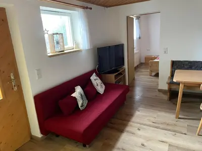 Ein Sitzbereich in der Unterkunft Ferienwohnung in ruhiger Lage in Bischofshofen