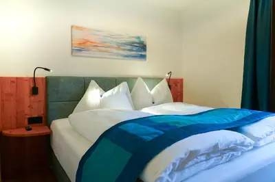 Ein Bett oder Betten in einem Zimmer der Unterkunft Haus Alpenblick