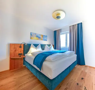 Ein Bett oder Betten in einem Zimmer der Unterkunft Haus Alpenblick