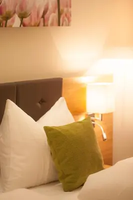 Ein Bett oder Betten in einem Zimmer der Unterkunft Hotel-Gasthof Beim Böckhiasl