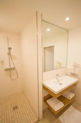 Ein Badezimmer in der Unterkunft Hotel-Gasthof Beim Böckhiasl