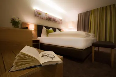 Ein Bett oder Betten in einem Zimmer der Unterkunft Hotel-Gasthof Beim Böckhiasl