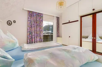 Ein Bett oder Betten in einem Zimmer der Unterkunft Ferienhaus am Tullnberg