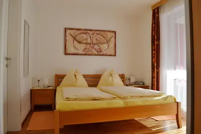 Ein Bett oder Betten in einem Zimmer der Unterkunft Appartementhaus Evelyn