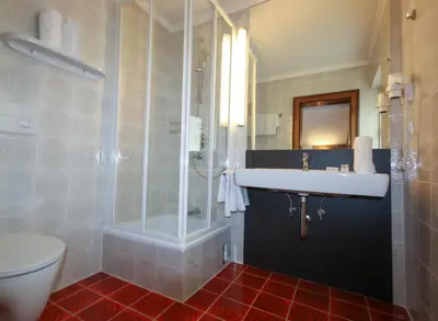 Ein Badezimmer in der Unterkunft Kia Ora Hotel Restaurant