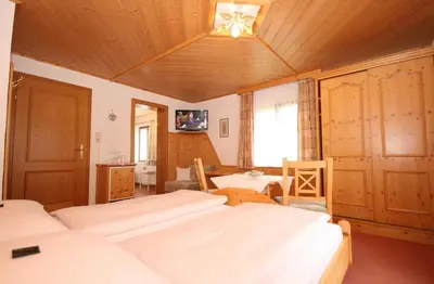 Ein Bett oder Betten in einem Zimmer der Unterkunft Haus Meissnitzer