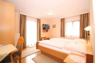 Ein Bett oder Betten in einem Zimmer der Unterkunft Haus Meissnitzer