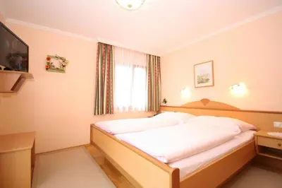 Ein Bett oder Betten in einem Zimmer der Unterkunft Haus Meissnitzer
