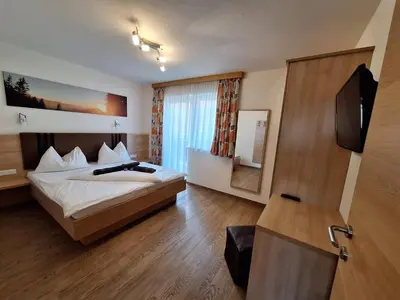 Ein Bett oder Betten in einem Zimmer der Unterkunft Die Schladmingerin Franz