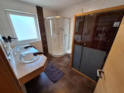 Ein Badezimmer in der Unterkunft Die Schladmingerin Franz