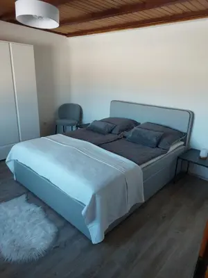 Ein Bett oder Betten in einem Zimmer der Unterkunft Ferienhaus Frankenmarkt