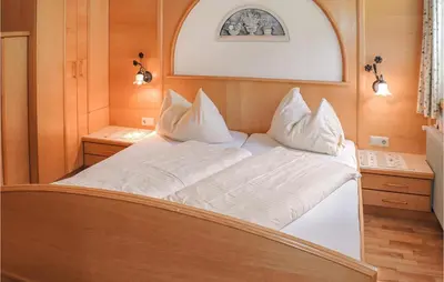 Ein Bett oder Betten in einem Zimmer der Unterkunft Sehr Schoene Ferienwohnung
