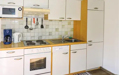 Küche/Küchenzeile in der Unterkunft Sehr Schoene Ferienwohnung