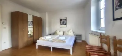 Ein Bett oder Betten in einem Zimmer der Unterkunft Hoamathaus II by Alpenidyll Apartments