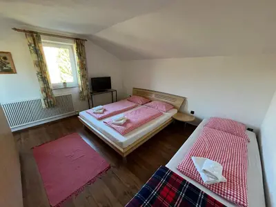 Ein Bett oder Betten in einem Zimmer der Unterkunft Ferienwohnung am Stambach