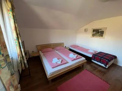 Ein Bett oder Betten in einem Zimmer der Unterkunft Ferienwohnung am Stambach