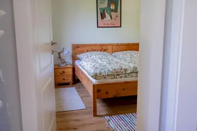 Ein Bett oder Betten in einem Zimmer der Unterkunft Cottage Bad Ischl