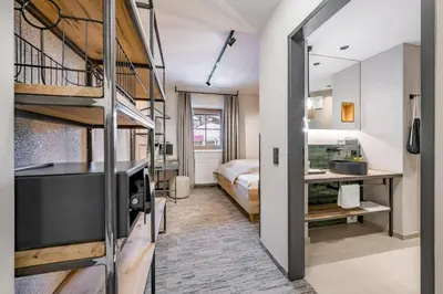 Ein Bett oder Betten in einem Zimmer der Unterkunft Hotel LÜ - Adults Only