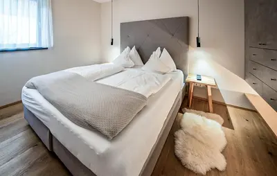 Ein Bett oder Betten in einem Zimmer der Unterkunft Ferienhaus Mit Sauna Katschb