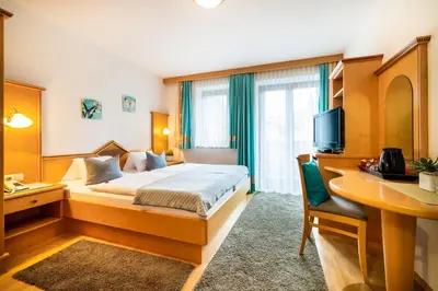 Ein Bett oder Betten in einem Zimmer der Unterkunft Sportpension Bergblick