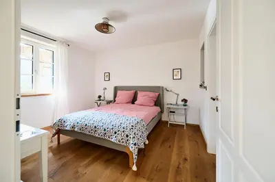 Ein Bett oder Betten in einem Zimmer der Unterkunft Ferienwohnungen Haus Rose Marie - Your Austrian Home