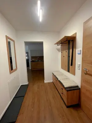 Ein Bett oder Betten in einem Zimmer der Unterkunft Wohnen am Almufer - Ferienwohnung Straßmair