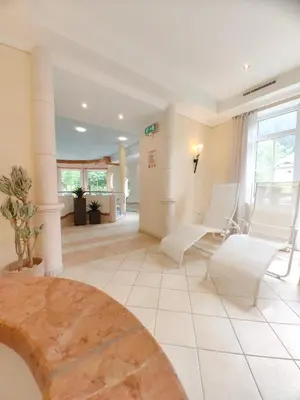 Ein Sitzbereich in der Unterkunft Hotel Angerwirt COSY HOLIDAY HOME