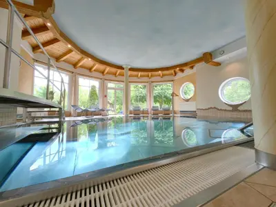 Der Swimmingpool an oder in der Nähe von Hotel Angerwirt COSY HOLIDAY HOME