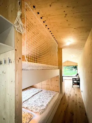 Ein Bett oder Betten in einem Zimmer der Unterkunft Die Klingerei - Tiny House Wiese - Your Austrian Home