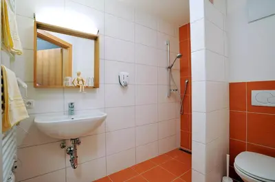 Ein Badezimmer in der Unterkunft Pension Schindlau