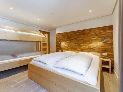 Ein Bett oder Betten in einem Zimmer der Unterkunft Amadé