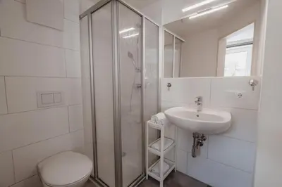 Ein Badezimmer in der Unterkunft Kalkalpen Apartments