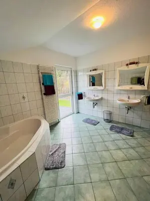 Ein Badezimmer in der Unterkunft Tanjas gemütliches Haus am Mondsee