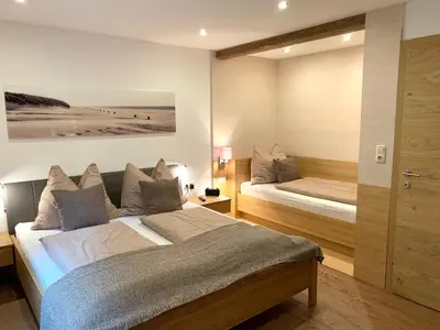 Ein Bett oder Betten in einem Zimmer der Unterkunft Haus Füsslmühle