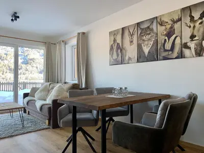 Ein Sitzbereich in der Unterkunft Almlodge Flachau
