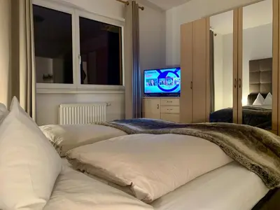 Ein Bett oder Betten in einem Zimmer der Unterkunft Almlodge Flachau
