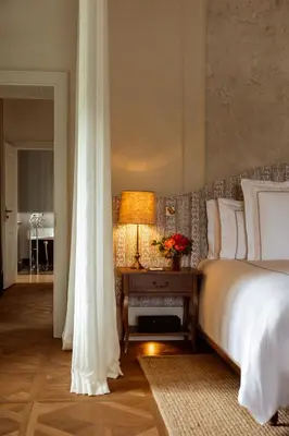 Ein Bett oder Betten in einem Zimmer der Unterkunft Rosewood Schloss Fuschl