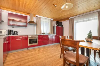 Küche/Küchenzeile in der Unterkunft Herzerl-Chalet Appartements