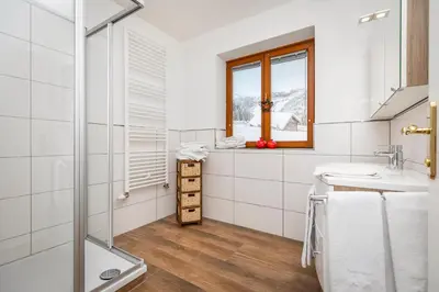 Ein Badezimmer in der Unterkunft Herzerl-Chalet Appartements