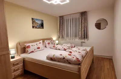 Ein Bett oder Betten in einem Zimmer der Unterkunft Chalet Lärchforst