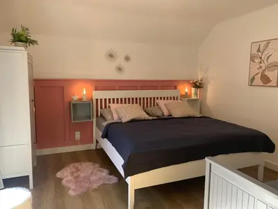 Ein Bett oder Betten in einem Zimmer der Unterkunft Iris Apartments