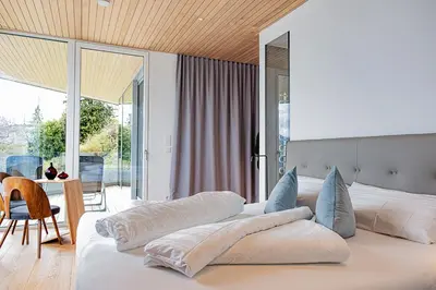 Ein Bett oder Betten in einem Zimmer der Unterkunft Luxus-Apartments direkt am Attersee