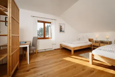 Ein Bett oder Betten in einem Zimmer der Unterkunft Haus Grundlsee